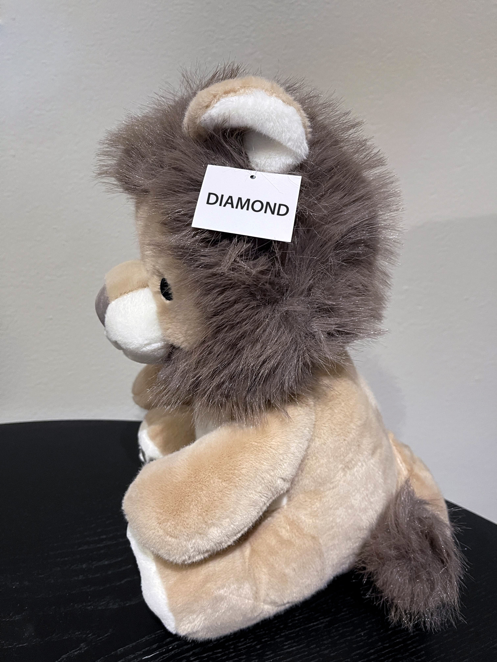 Diamond plush toy with visible DIAMOND tag