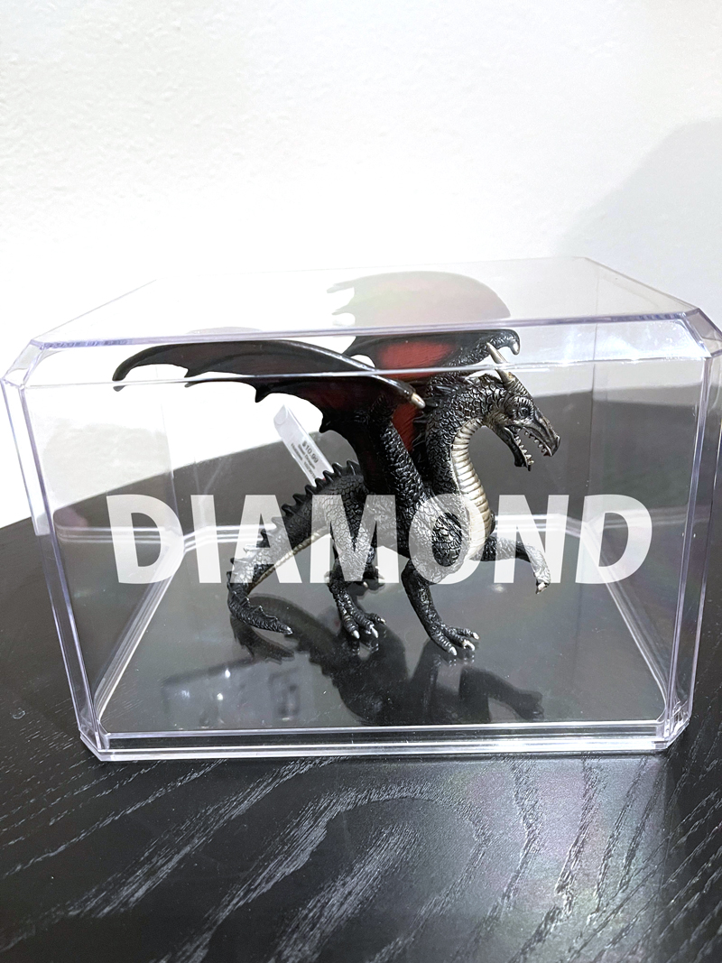 Diamond toy figure with branded product tag